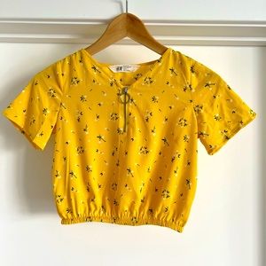 Girls H&M yellow with flowers top.